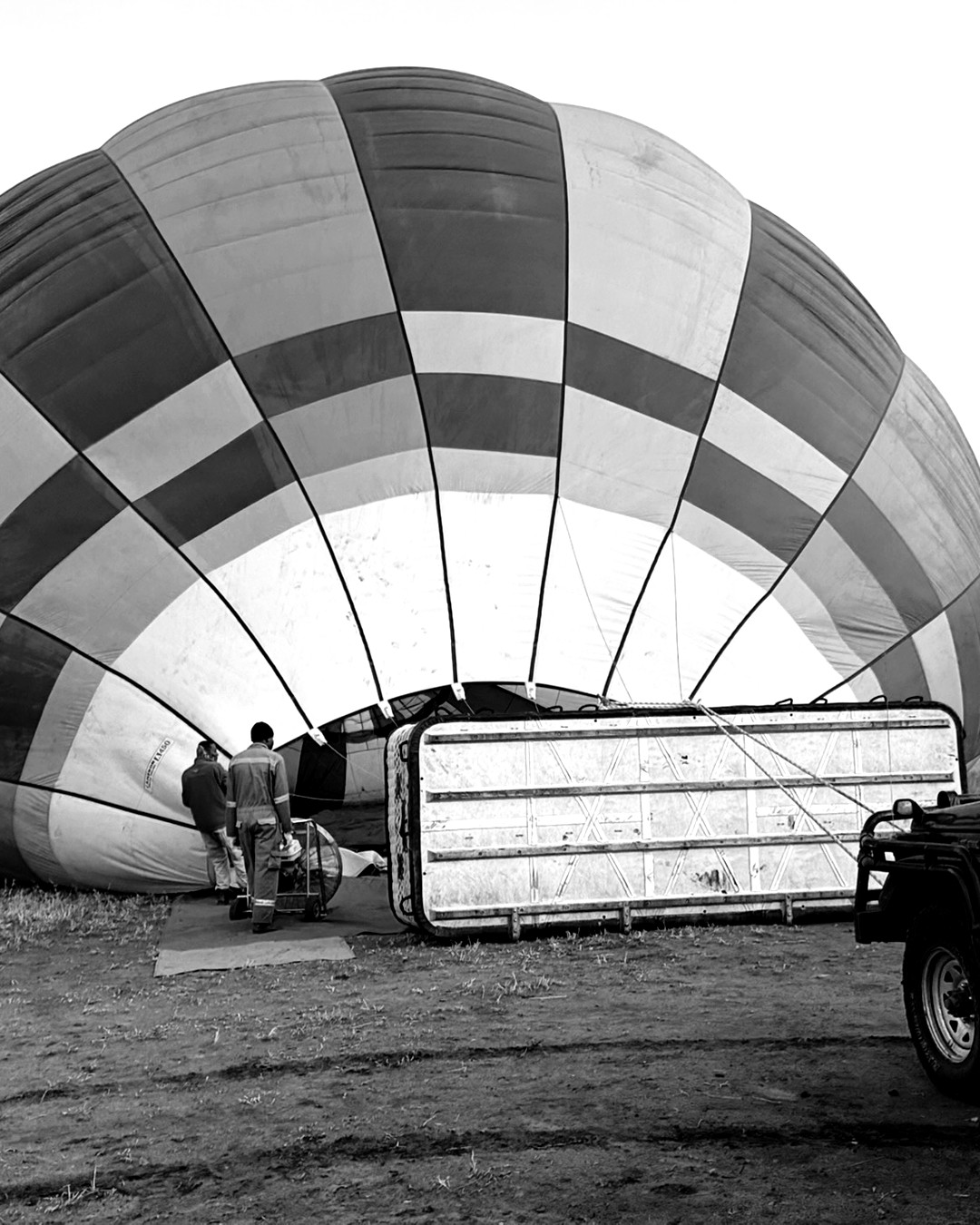 A balloon over the plains at dawn
